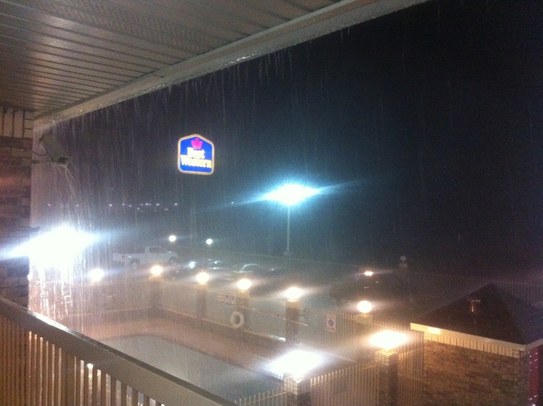 Looking outside from the 2nd floor of a Best Western in Huntsville, TX, rain coming down